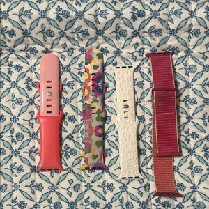 Apple Watch Bands in Pink, Multicolor, Cream, and Red